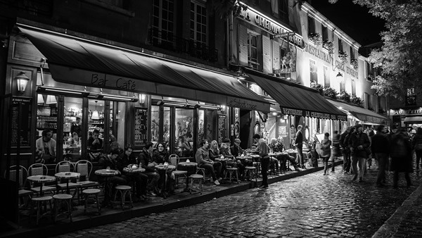 Cafes in Paris are especially busy at night.
