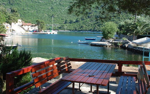 Apartment rental deck in Croatia on a lake.
