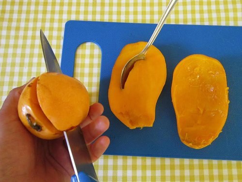 Cutting a mango in Mexico.