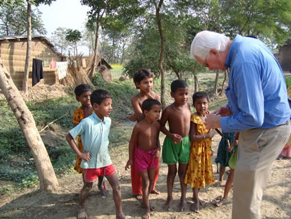 Showing photos, rural village, Rajshahi, Bangladesh.