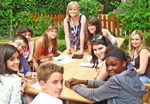 Teach English to children at  summer camps abroad.