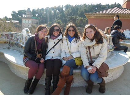 Author with three friends on a trip in Barcelona.