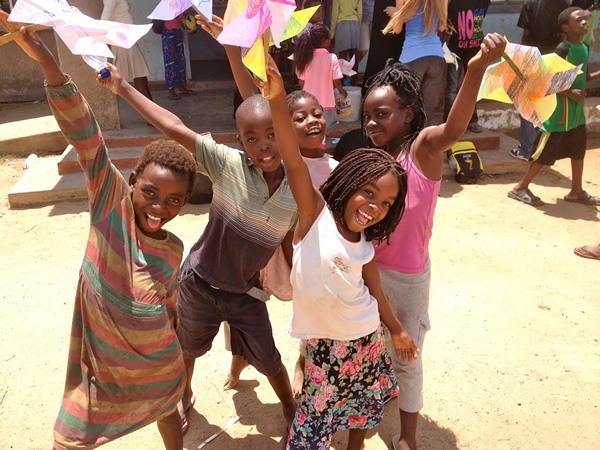Children in Zambia dancing.