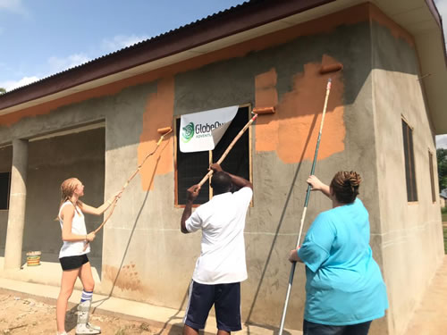 Painting houses in Ghana