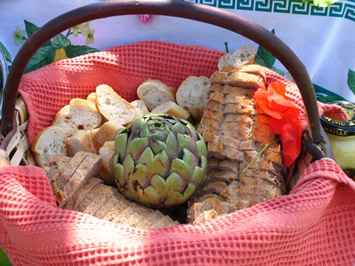 Fresh bread in and artichokes in France.