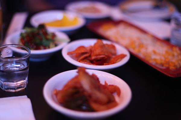 Appetizers and other dishes enjoyed during a hoesik in South Korea.