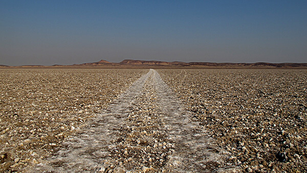 Salt tracks created by the Jeep coming from the lake.