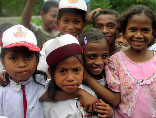 Welcoming cchoolsgirls in the village.