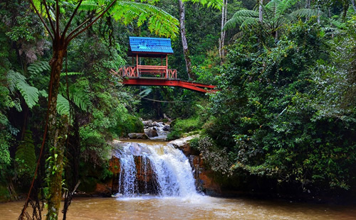 Waterfall under a bridge in the countryside of Malaysia.