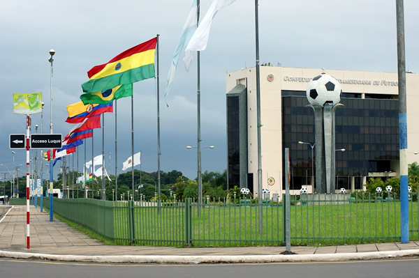 Football standium in Paraguay with flags.