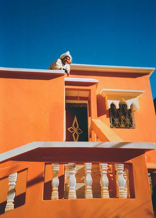 Man on top on patio in Morocco.