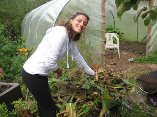 Regina, the author, gardening in Bath.