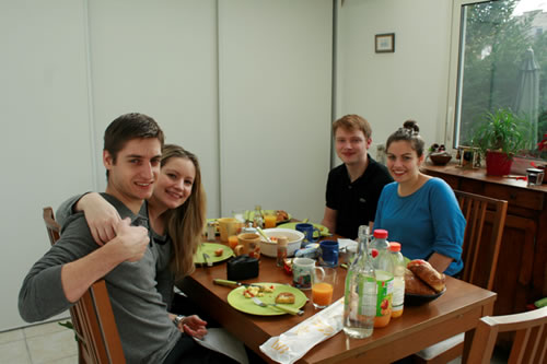 Enjoying breakfast with the family in Lyon.