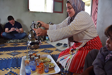 Serving Moroccan tea in village in Morocco.